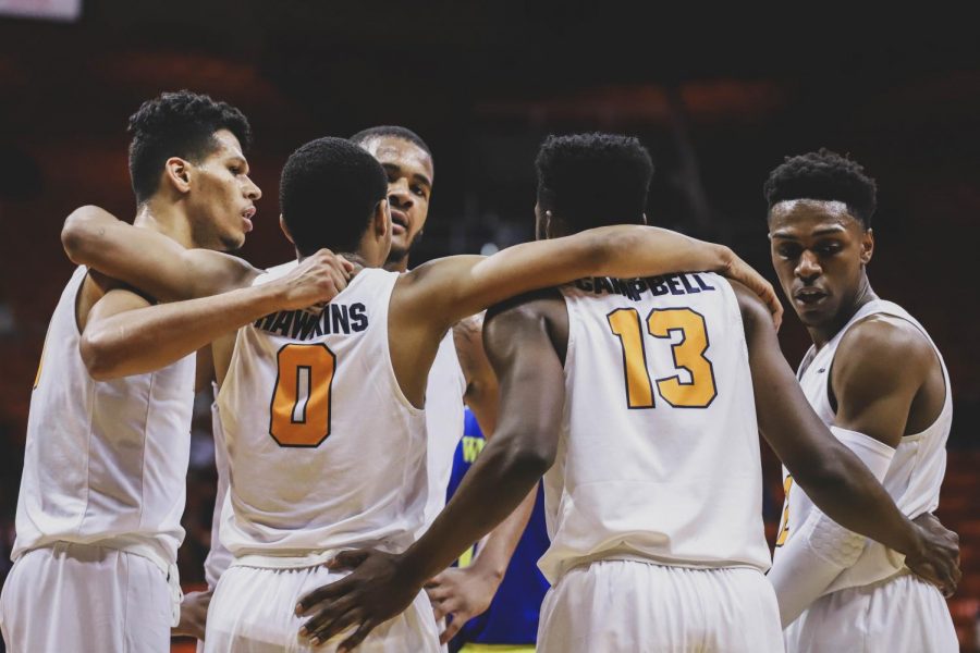 The Miners celebrate their win against the UC Riverside Highlanders at the Don Haskins Center on Saturday, Dec. 16. 