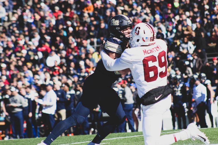  Stanford Junior Longsnapper Richard McNitzky battles against a Pitt defensive lineman Monday at the 85th annual Sun Bowl Game. Stanford defeated Pitt 14-13. 