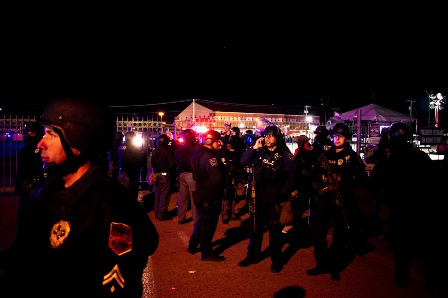 Law enforcement waits patiently to diffuse tensions between protestors outside of both rallies.