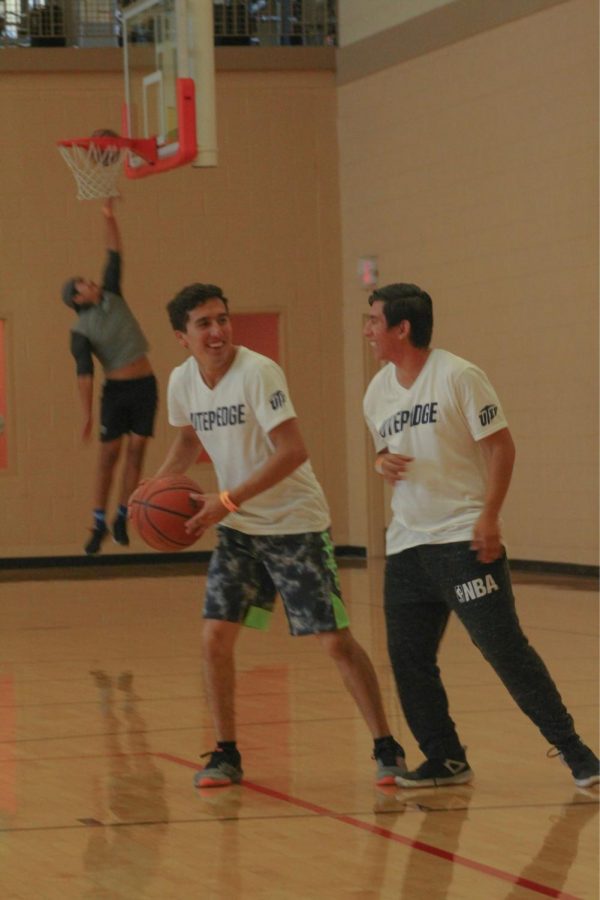 Students enjoy a game of basketball at the 4th annual Miner Melt.