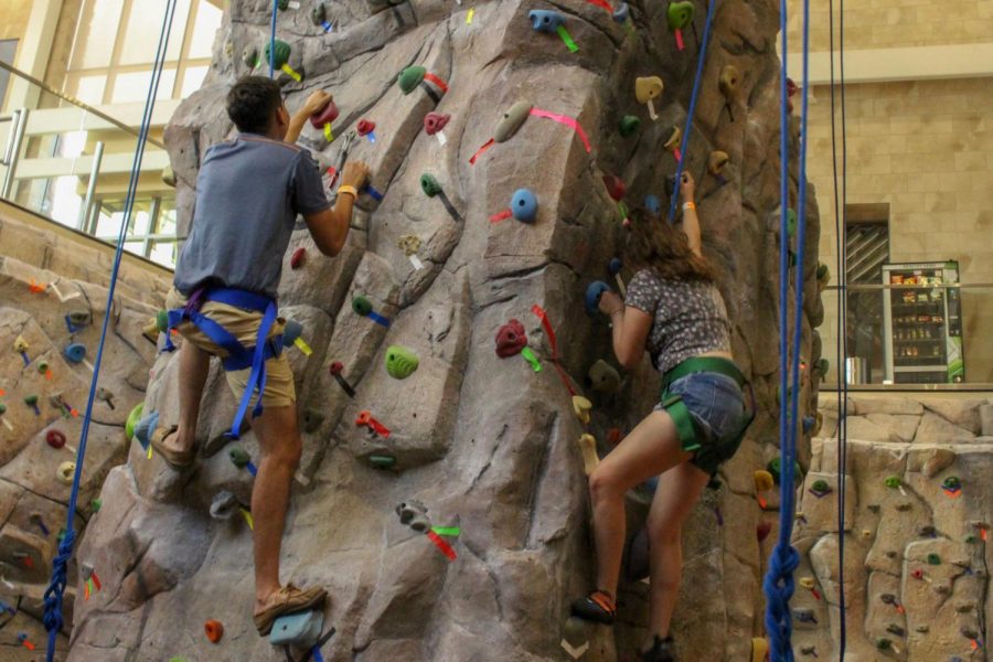 Students climb a rock wall at the 4th annual Miner Melt