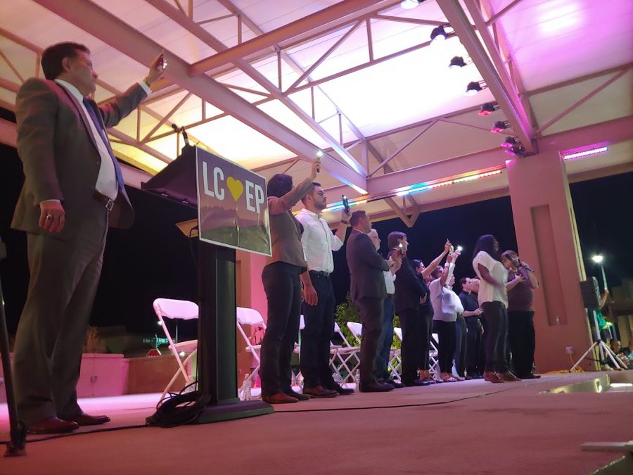 Las Cruces Mayor Ken Miyagashima (far left) hosted a vigil at Plaza de Las Cruces in Downtown Las Cruces Monday, Aug. 4, to honor victims of El Pasos mass shooting. He was joined onstage by city councilors Jack Eackman, Gabe Vasquez, Yvonne Flores; New Mexico Lt. Gov. Howie Morales; U.S. Rep for 2nd Congressional District Xochitl Torres Small, among other area leaders, who spoke individually during the candlelight vigil.