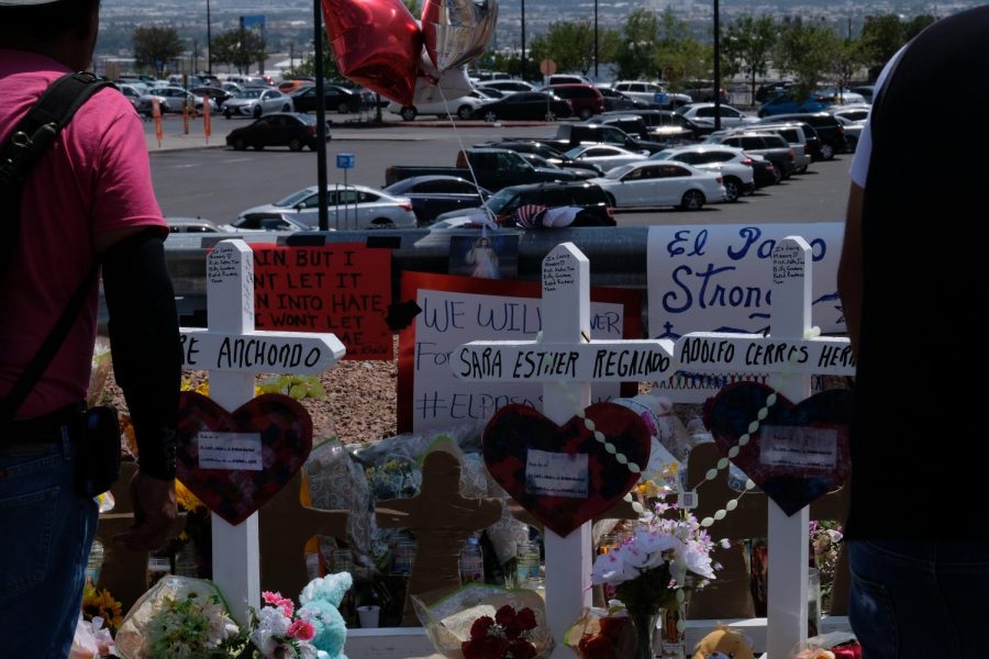 The Cielo Vista Wal-Mart overlooks the makeshift memorials created for the victims of Saturdays tragedy.