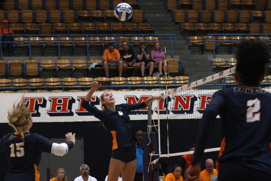 Middle blocker Mallory Yost scores against Coppin State Friday Sept. 6, 2019.