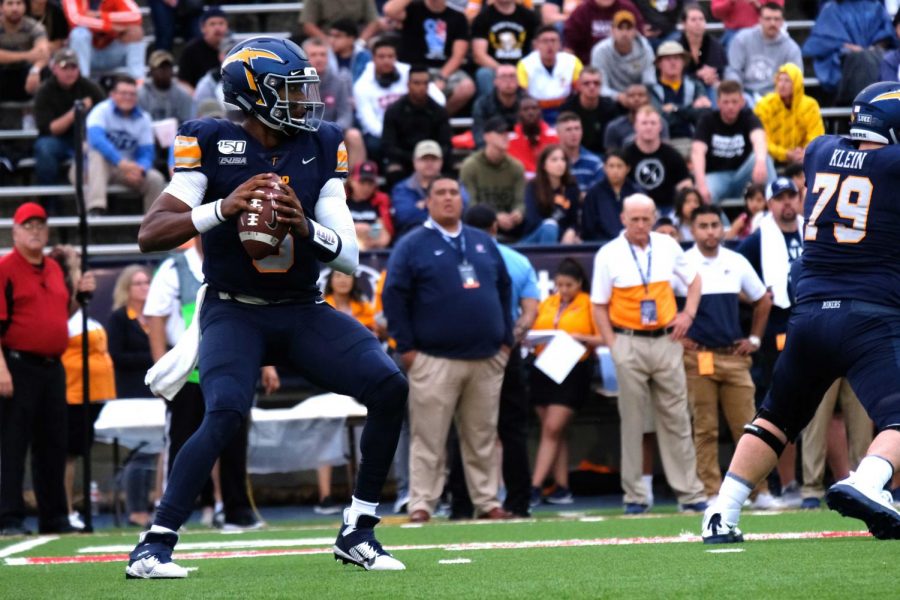 Senior quarterback Brandon Jones drops back in pocket as he looks downfield vs. Nevada.