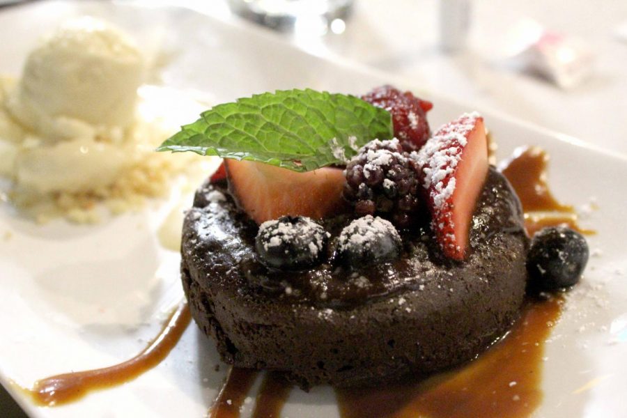 Anson 11’s Warm Chocolate Cake, covered in caramel, strawberries and blueberries, is ready to be served to Eat Authentico! Restaurant Crawl participants Thursday,  Sept. 26. 