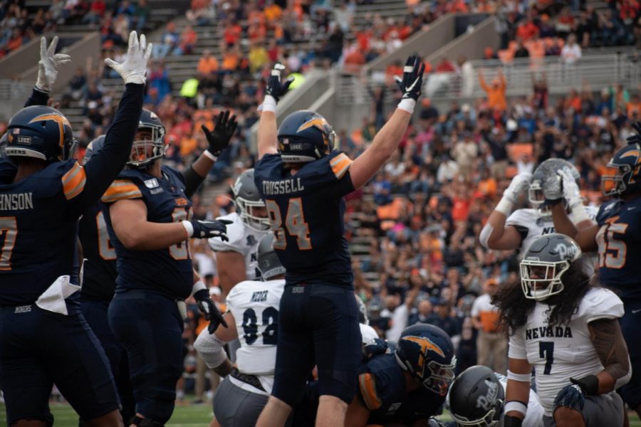 UTEP players celebrate thier first touchdown of the game against the University of Nevada.