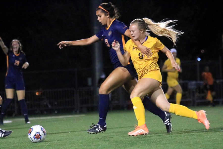 Midfielder Adriana Lopez defends the ball against Wyoming with a final score of 2-2 on Thursday, Aug 22.