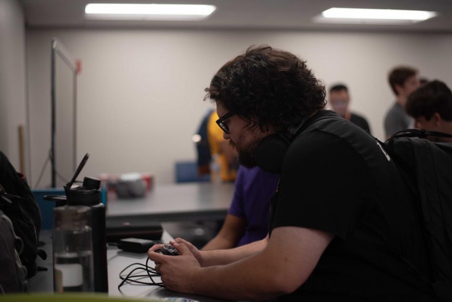 Guests and UTEP students are invited to play video games and have free snacks as the Honeybadgers create a friendly atmosphere at thier first team meeting at UTEP.