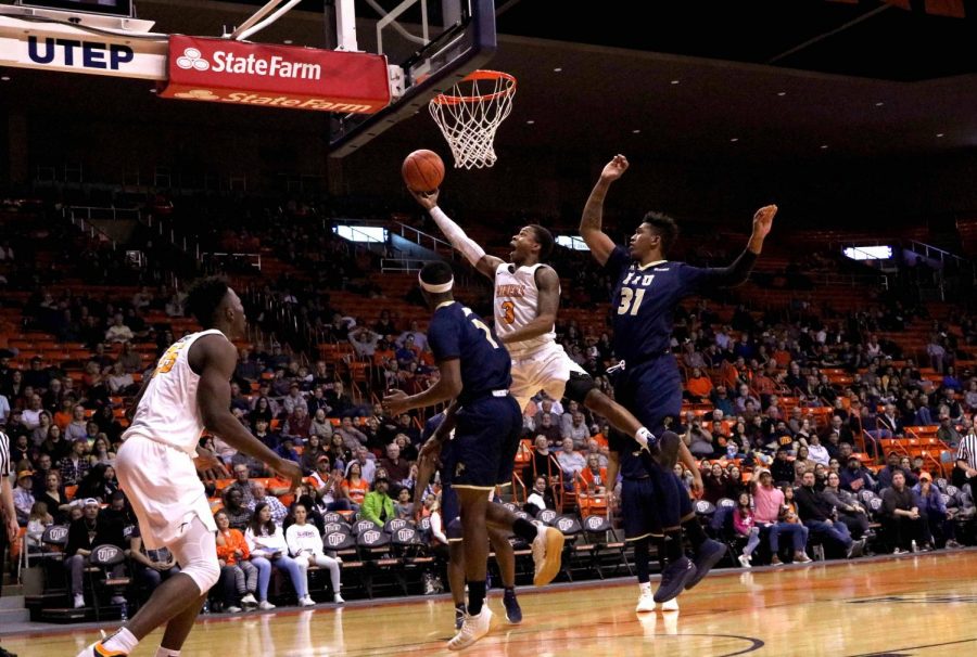 Former Miner Evan Gilyard drives to the basket vs. Florida International.