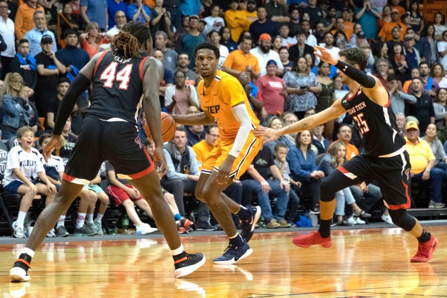 Sophomore guard Jordan Lathon pushes the ball upcourt against Texas Tech in charity game Oct. 12, 2019.