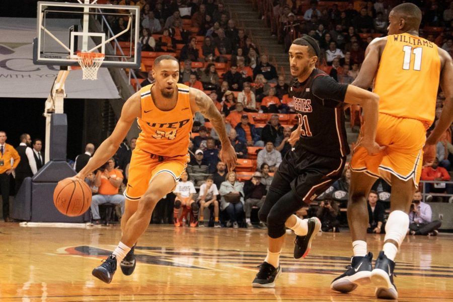 Graduate student and UTEP guard Daryl Edwards drives the ball to the net against NMSU at the Don Haskins Center.