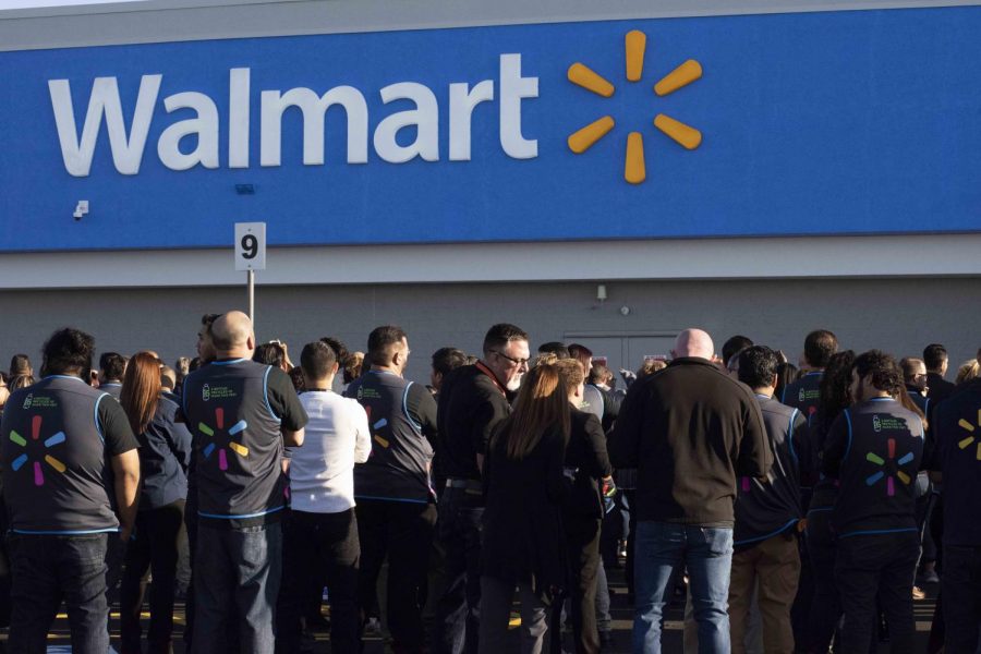 Cielo Vista Walmart employees gathered outside the store Thursday, Nov. 14. After opening the store’s doors for customers, they cheered and welcomed people as they entered. 