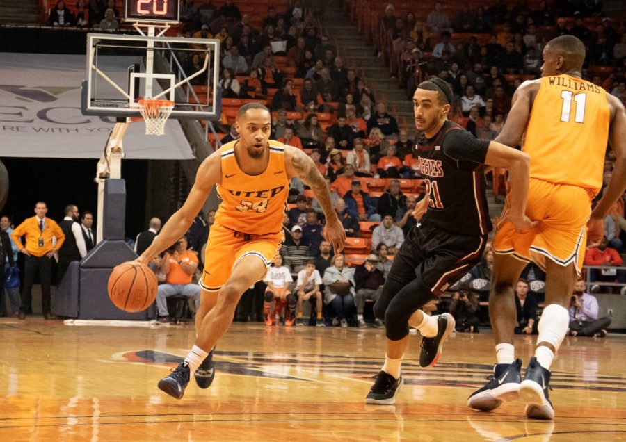 Graduate student and UTEP guard Daryl Edwards drives the ball to the net against NMSU at the Don Haskins Center.