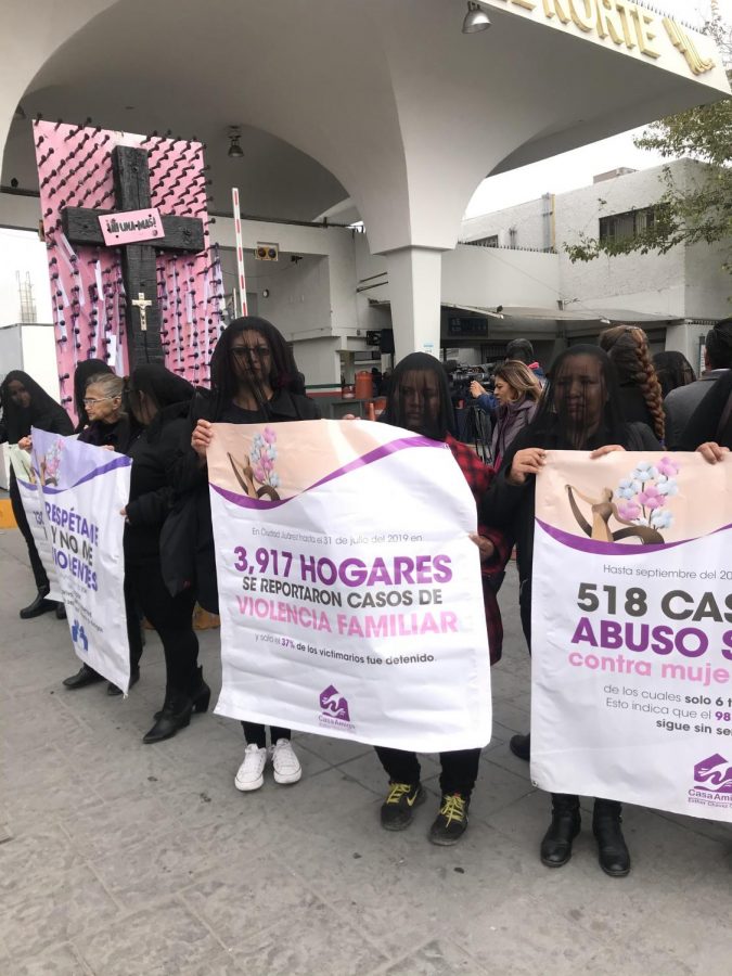 Anti-femicide advocates standing in solidarity to protests the disappearances and deaths of women throughout the country late November in front the Paso del Norte international port of entry.