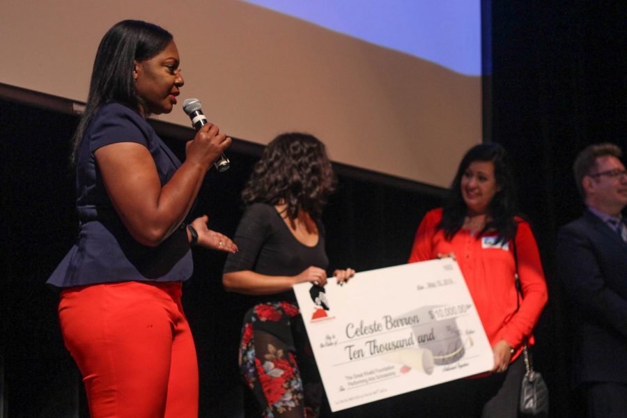 Linda Wolfe, executive director of The Great Khalid Foundation gives out scholarship check to student from El Paso, Texas.