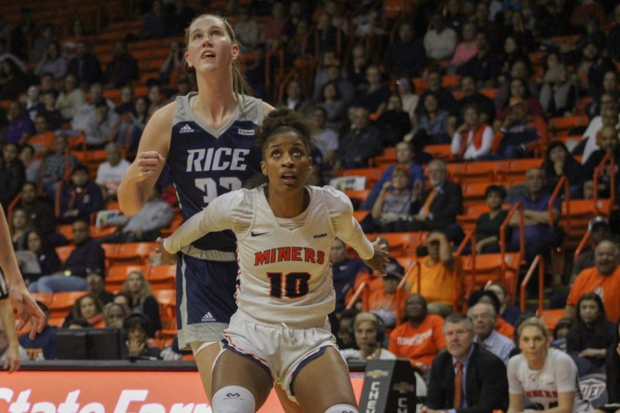 UTEP senior forward Jade Rochelle boxes out Rice junior center Nancy Mulkey Jan. 24 at the Don Haskins Center. 