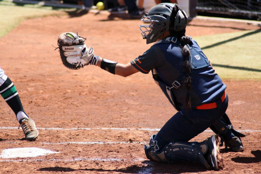 Catcher Linda Garcia ready for the throw of pitcher Kira McKechnie Sunday April 15 at Helen of Troy Softball Complex.