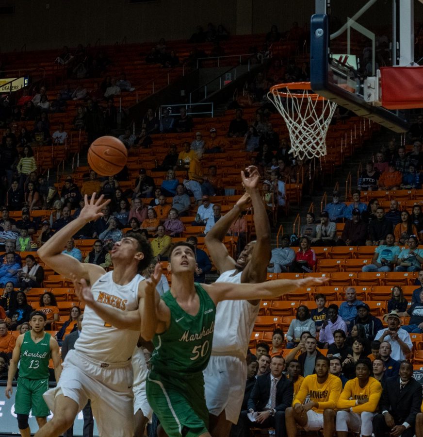 UTEP forwards Tydus Verhoeven and Bryson Williams fight for the rebound versus Marshall Sat, Feb.15 at the Don Haskins Center.