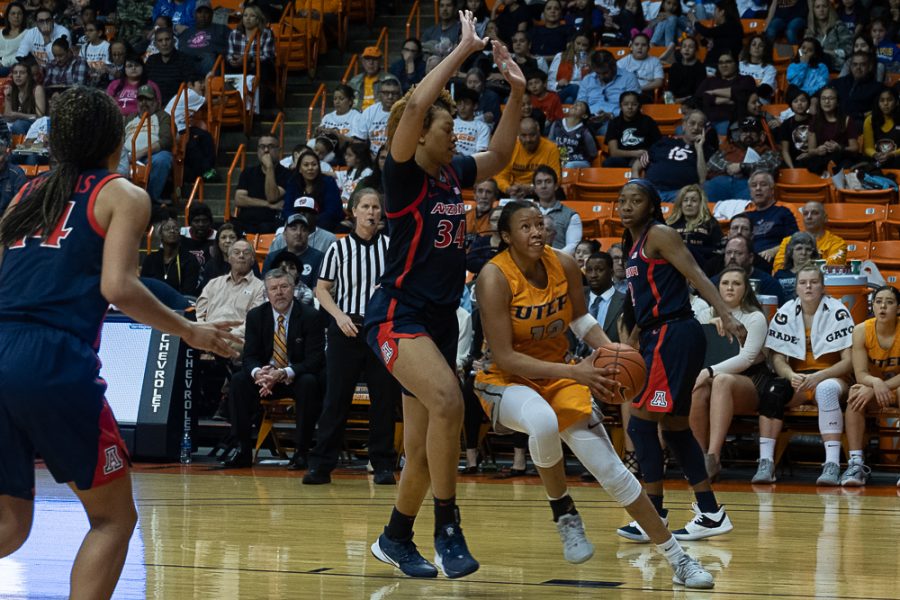 UTEP+senior+forward+Ariona+Gill+drives+the+basket+versus+Arizona+Dec.+7+2019.