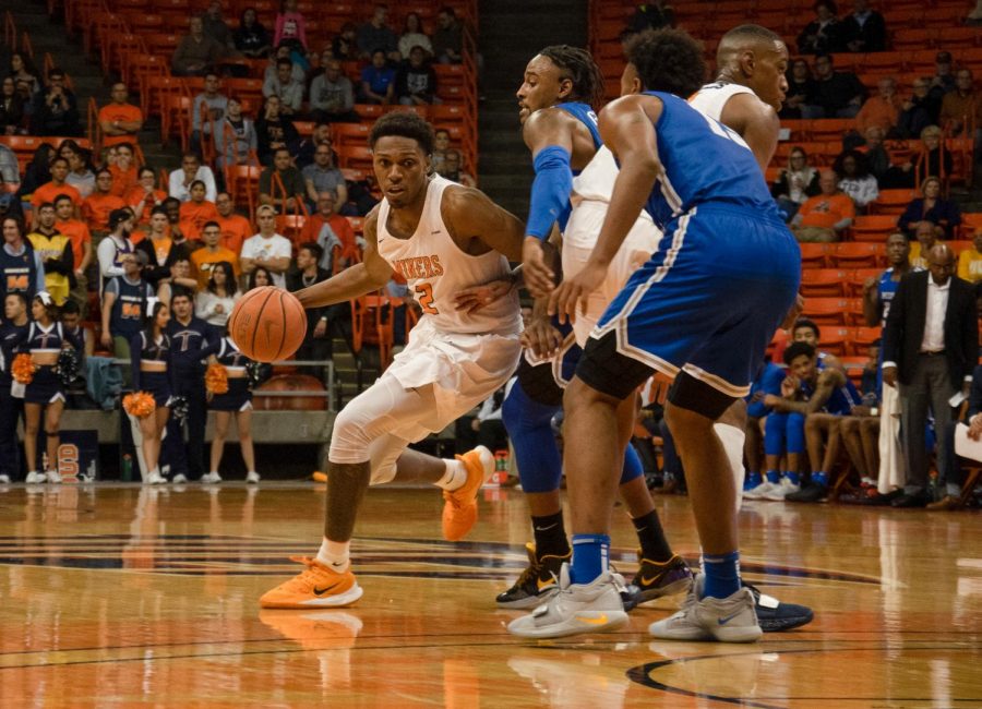 Sophomore guard Jordan Lathon dribbles the ball around his teammates pick in 67-66 win over Middle Tennessee State Jan. 30.