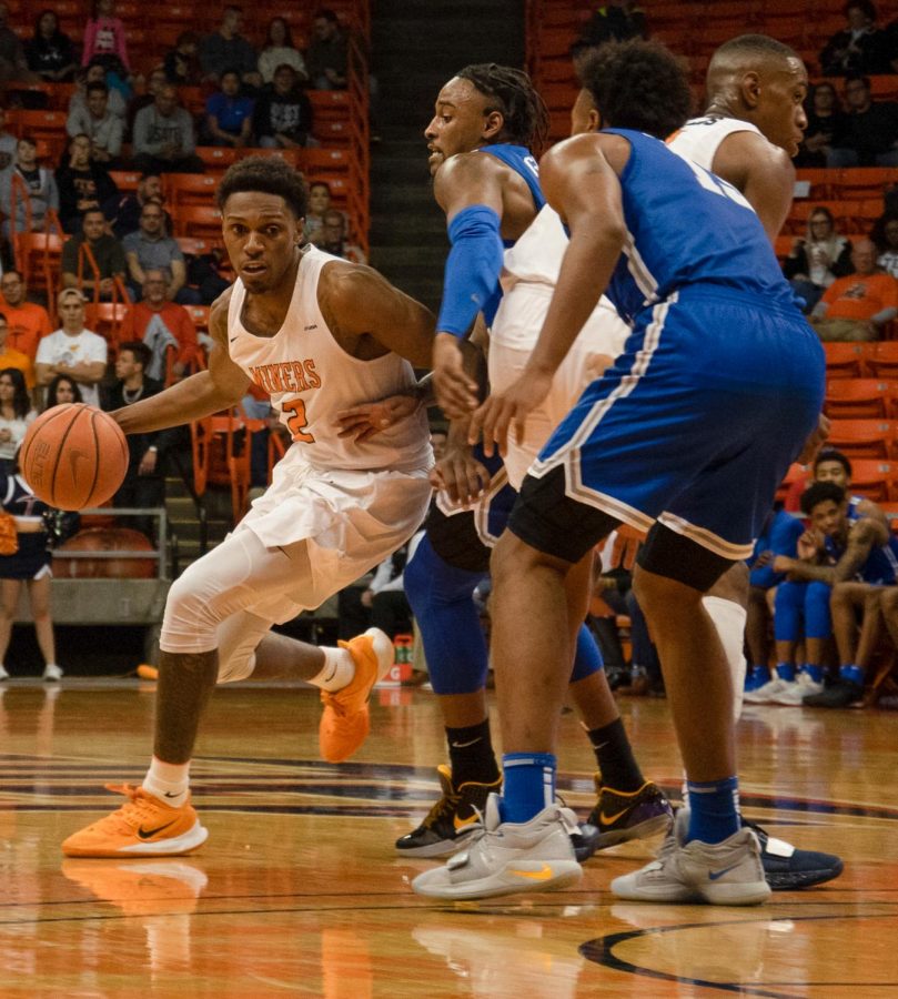 Sophomore guard Jordan Lathon dribbles the ball around his teammates pick in 67-66 win over Middle Tennessee State Jan. 30.