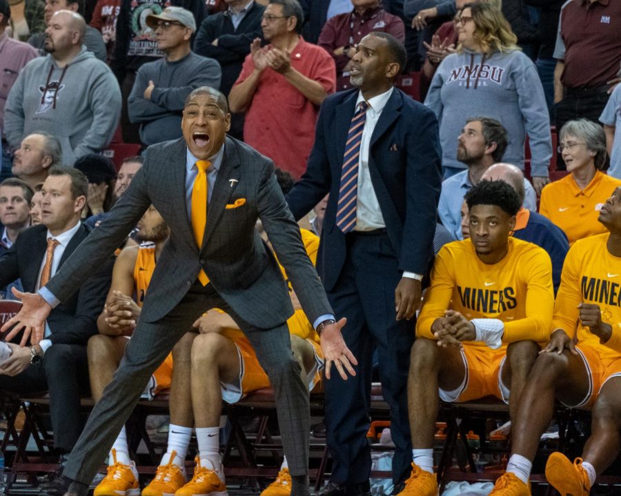 UTEP Head Coach Rodney Terry voices his displeasure versus New Mexico State  as UTEP President Heather Wilson and former El Paso congressman Beto O Rourke look on from third row  Dec. 3, 2019.