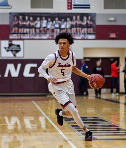 Incoming junior guard Emmanuel White bringing ball down court for Obra Tompkins High School.