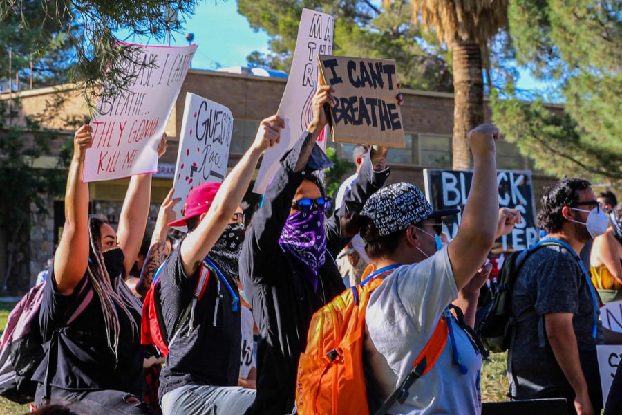 El Pasoans march from Memorial Park to El Paso police headquarters Sunday May 31.
