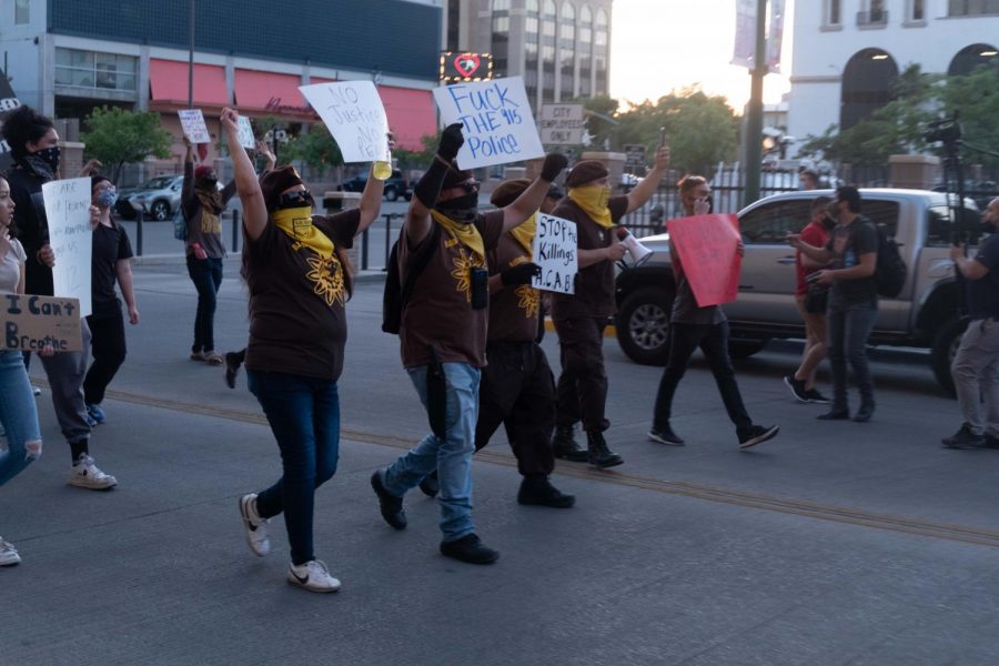 Protesters march in downtown El Paso towards El Paso County Courthouse June 2.