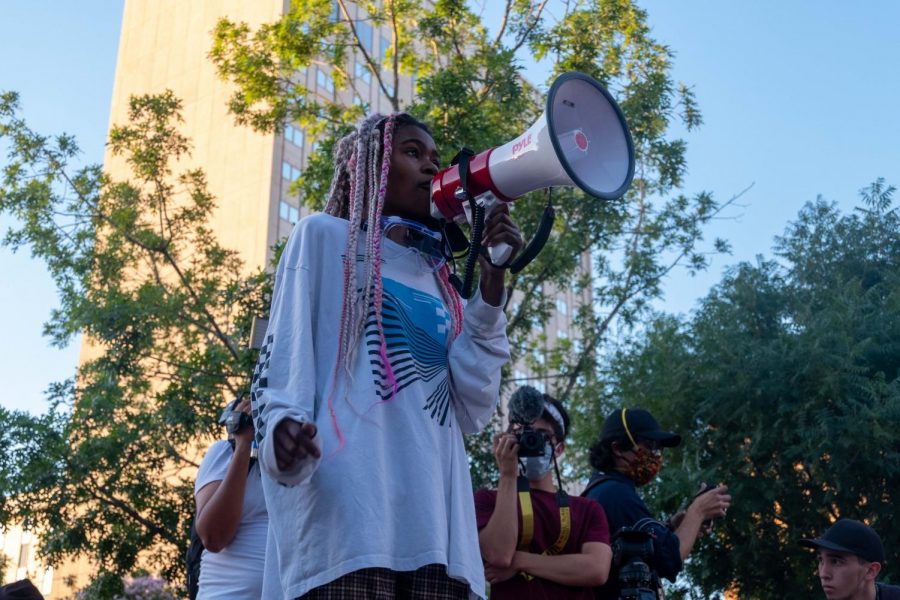 Katie Titan address protest crowd in San Jacinto Plaza during Defund the Police rally in downtown El Paso June 2010.