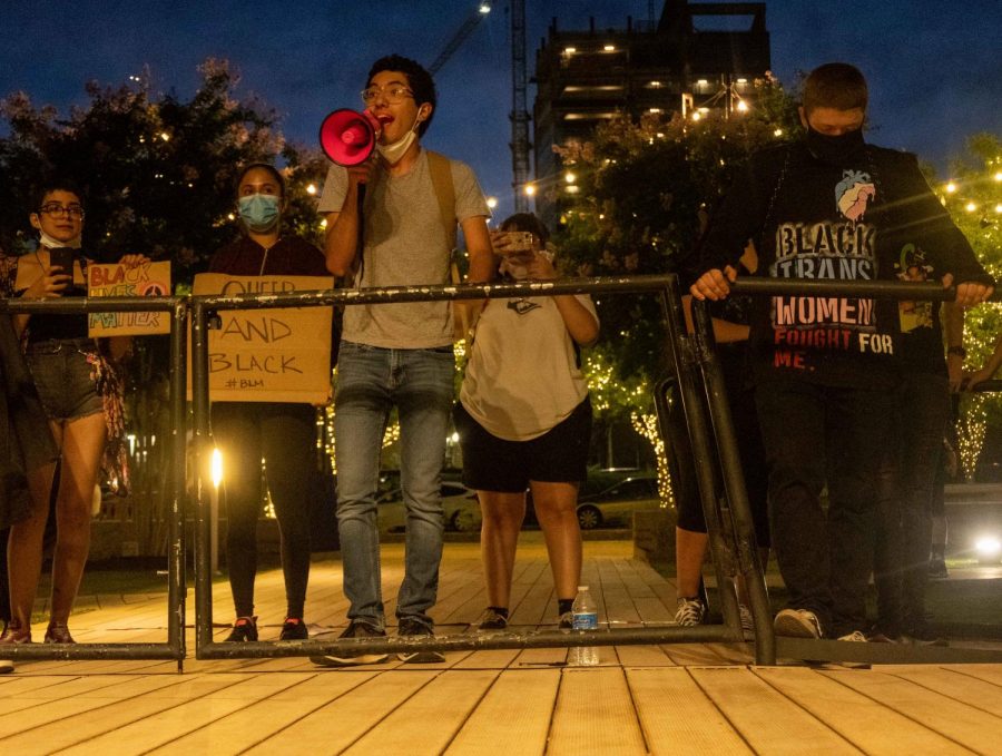 Erik Armendariz speaks to crowd at San Jacinto Plaza during Queer Solidarity March June 13, 2020.