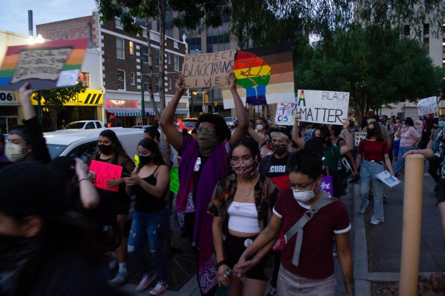 Protesters march down Stanton Street with signs supporting Black Lives during Queer Solidarity March June 13, 2020.