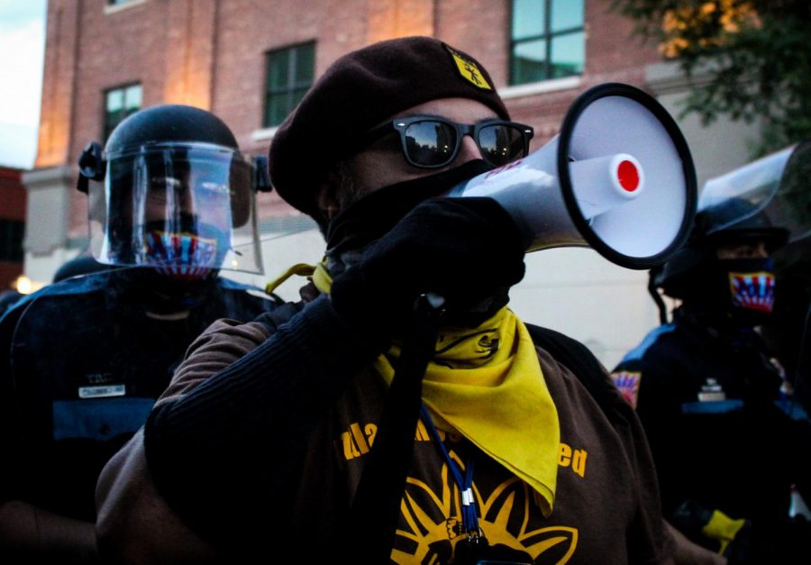 A member of the Brown Berets Del Chuco, who organized the June 2 protest at Aztec Calendar Park, speaks against police brutality. 