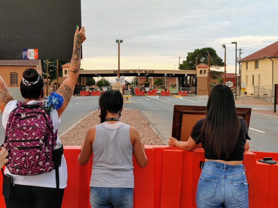 Protesters hold up signs at Cassidy Gate outside of Fort Bliss demanding justice in the suspected murder of Vanessa Guillen July 4, 2020.