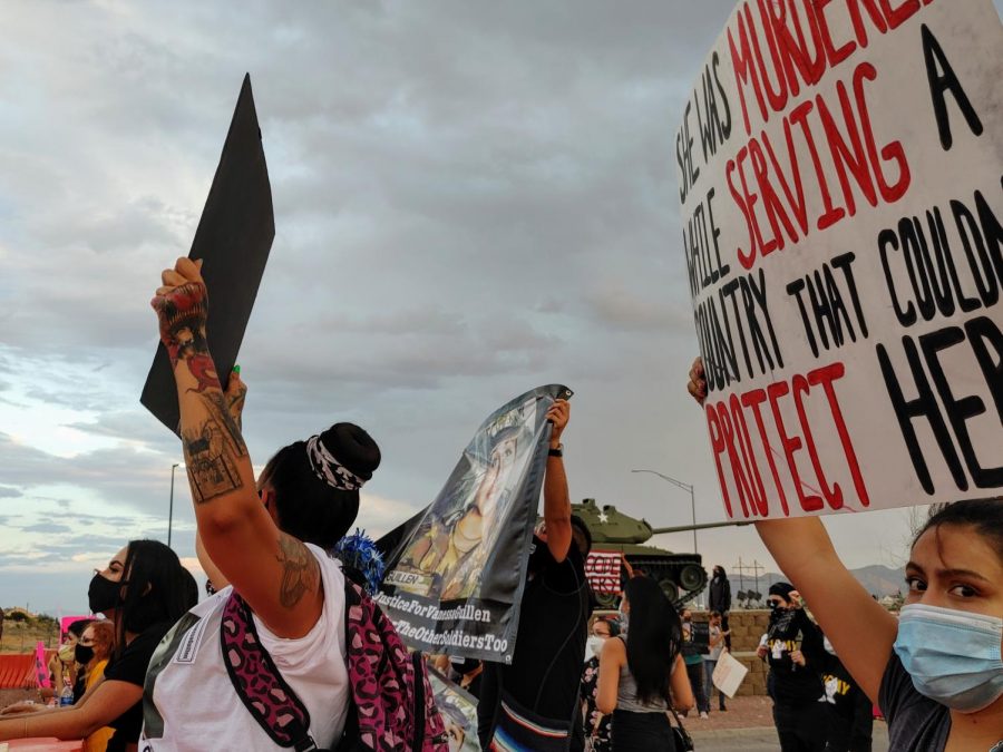 Protesters hold up signs at Cassidy Gate outside of Fort Bliss demanding justice in the suspected murder of Vanessa Guillen July 4, 2020.