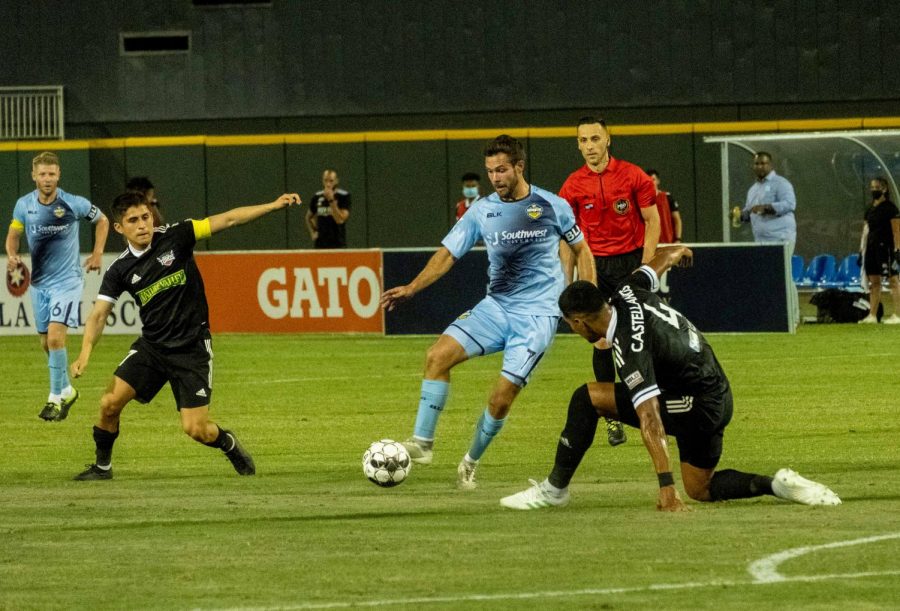 El Paso midfielder Dylan Mares penetrates the RIo Grande defense taking an opposing player off his feet with his footwork Saturday July 11, 2020.