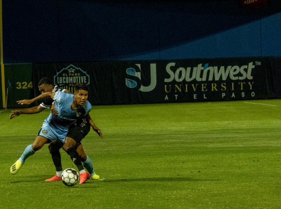 El Paso midfielder Bryam Rebellion fights through opponents body block versus the Rio Grande Valley Toros Saturday July 11, 2020.