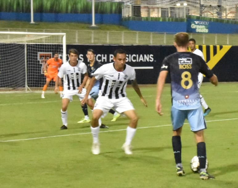 Locomotive midfielder Nick Ross tries to set up goal early versus Colorado Springs Switchback Saturday Aug. 8, 2020.