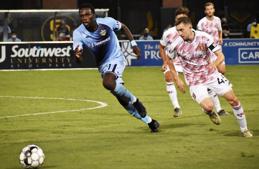 Locomotive midfielder Distel Zola fights for possession against Real Monarch forward Damien German Aug. 29, 2020.