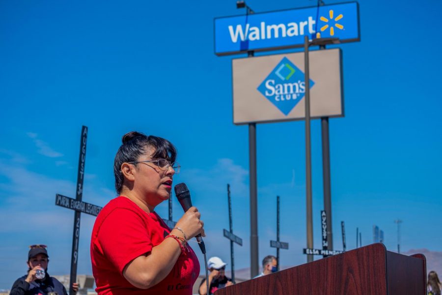 Crowd is addressed during Walmart memorial for the 23 shooting victims from last years mass shooting Aug. 3, 2020.