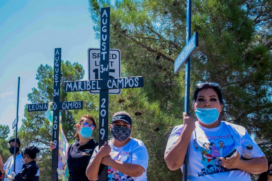 Crosses are held for each of the 23 victims of the Cielo Vista Walmart shooting Aug. 3, 2020.