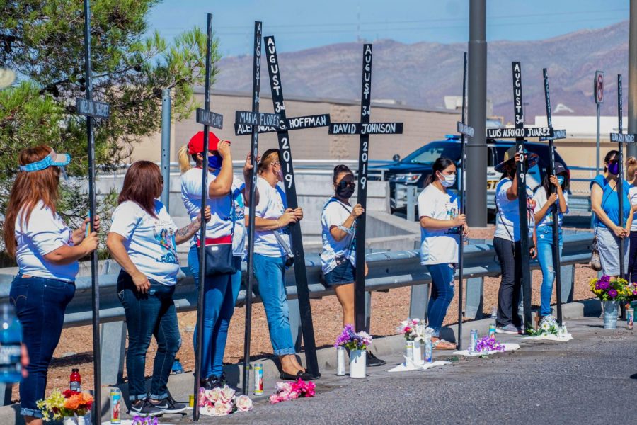 Cross bearers stand by at the Cielo Vista Walmart memorial  honoring the victims of last years mass shooting Aug. 3, 2020.