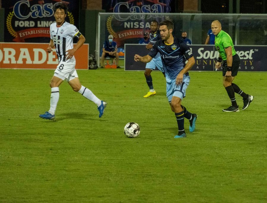 Locomotive forward Leandro Carrijo pushes ball downfield versus Colorado Springs saturday Aug. 8, 2020.