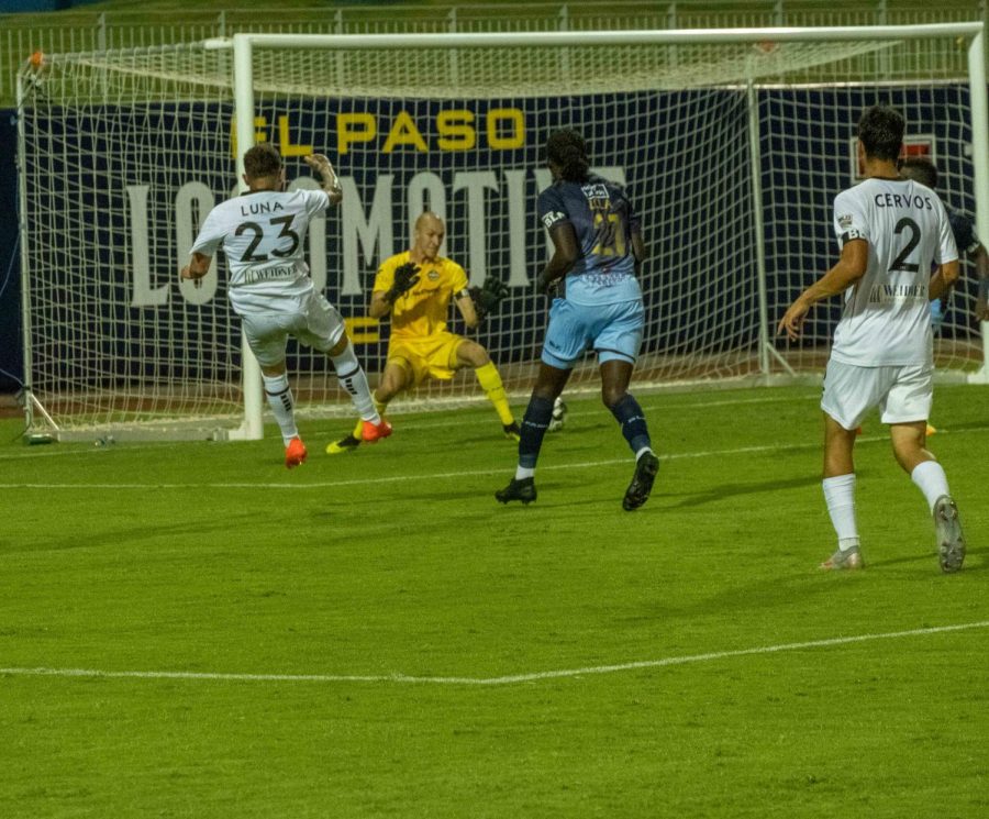 Colorado Springs attacking midfielder Uvaldo Luna slides a goal past Locomotive goal keeper late in loss to El  Paso Saturday Aug. 8, 2020.