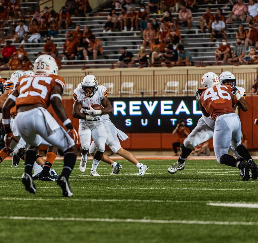 UTEP+freshman+running+back+Deion+Hankins+looks+for+running+room+versus+Texas+Longhorns+Saturday+Sept.+12.