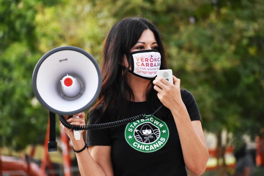 Veronica Carbajal, a candidate for mayor of El Paso, protesting proposed energy plant at San Jacinto Plaza.