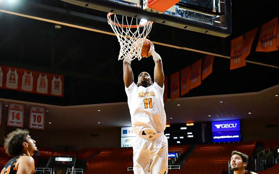 UTEP senior forward Bryson Williams throws down a thunderous dunk on an aggreisive break to basket against the University of Texas at Permian Basin Nov. 26.