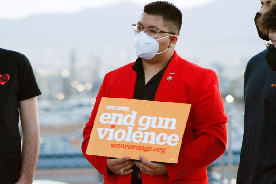 Jesus Ramos holds a “We can end gun violence” sign at Cielo Vista Walmart while speeches are given in call to end gun violence on March 29, 2021. Photo by Albert Silva. 

 