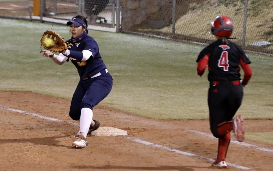 UTEP first baseman, Arianna Valles receives a throw for a put-out of a Texas Tech batter March 20 in Lubbock, Texas.